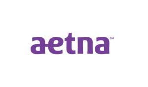 Andy & TJ Married with mics Aetna Logo