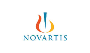 Andy & TJ Married Voiceover Actor Novartis Logo